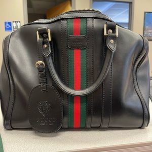 Shoulder purse with guitar strap leather